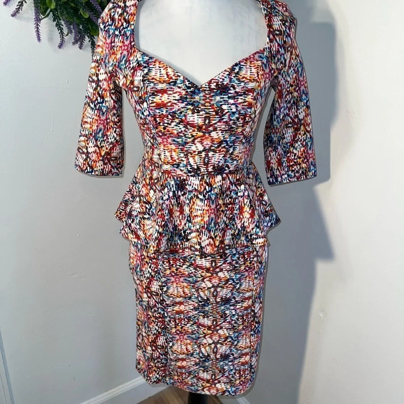 Kardashian Kollection Dresses & Skirts - Kardashian Collection S,peplum mini dress exposed decorative back zipper closure